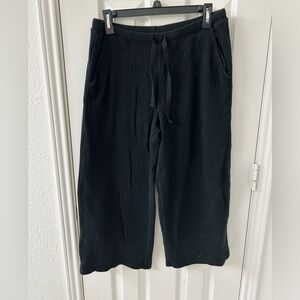 Stars above black women’s wide leg lounge pants